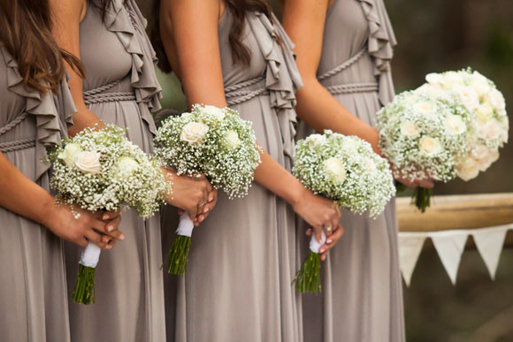 Closeup of bouquets being held by bridesmaids