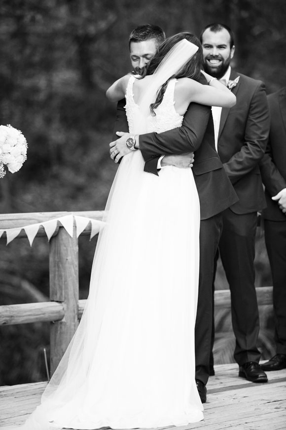 Black and white photo of Carla hugging Josh