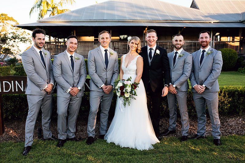 Groom with his Bride and Groomsmen.
