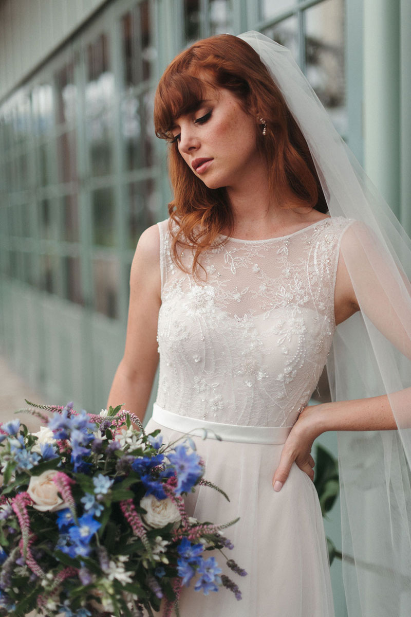Close up of bride wearing Fleur gown from French by Wendy Makin.