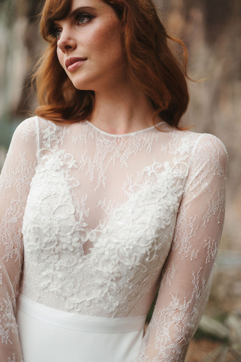Close up of an embroidered lace bodice of a wedding dress.