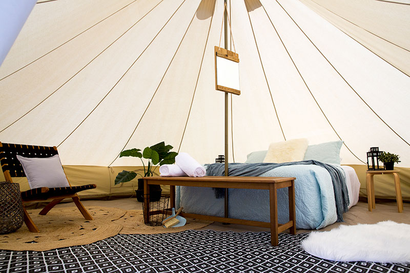 Inside a spacious and luxurious Bell tent from Glamping Days Hire Co.