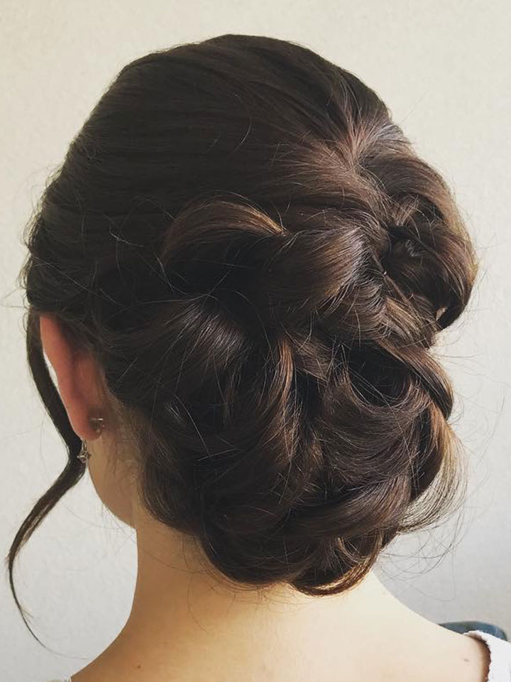 upstyle with braids on a dark haired bride-to-be.