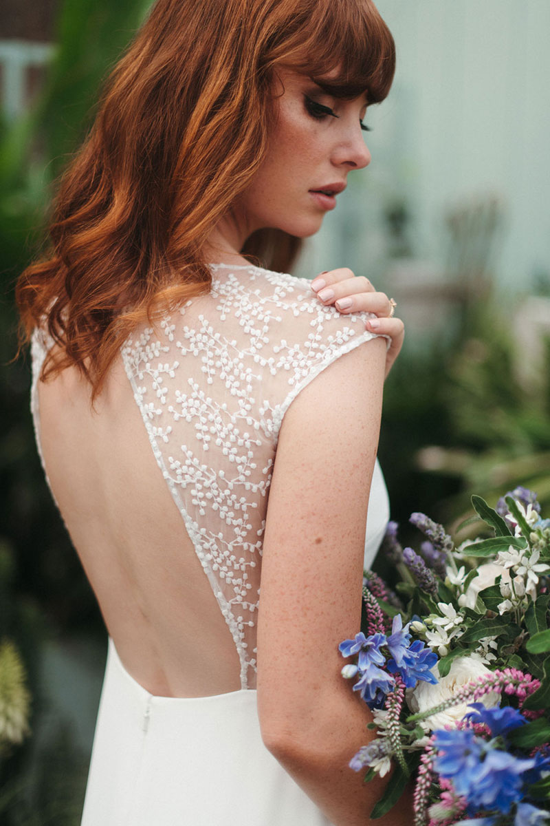 Bride wearing a gorgeous open back wedding gown called 'Lavande' from French by Wendy Makin.