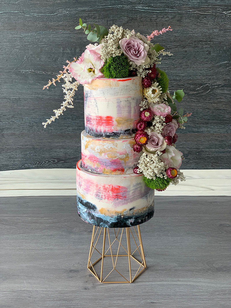 Colourful Hand painted wedding cake with florals.