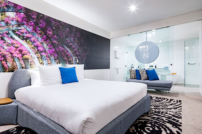 Stylish, spacious King sized bed and suite at Novotel Brisbane South Bank.