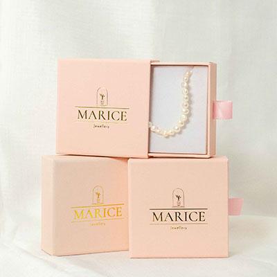3 Pink Marice Jewellery boxes, one with pearls displayed. 